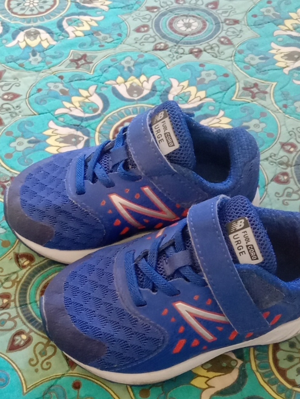 New Balance Blue Kids Sneakers with Orange Accents